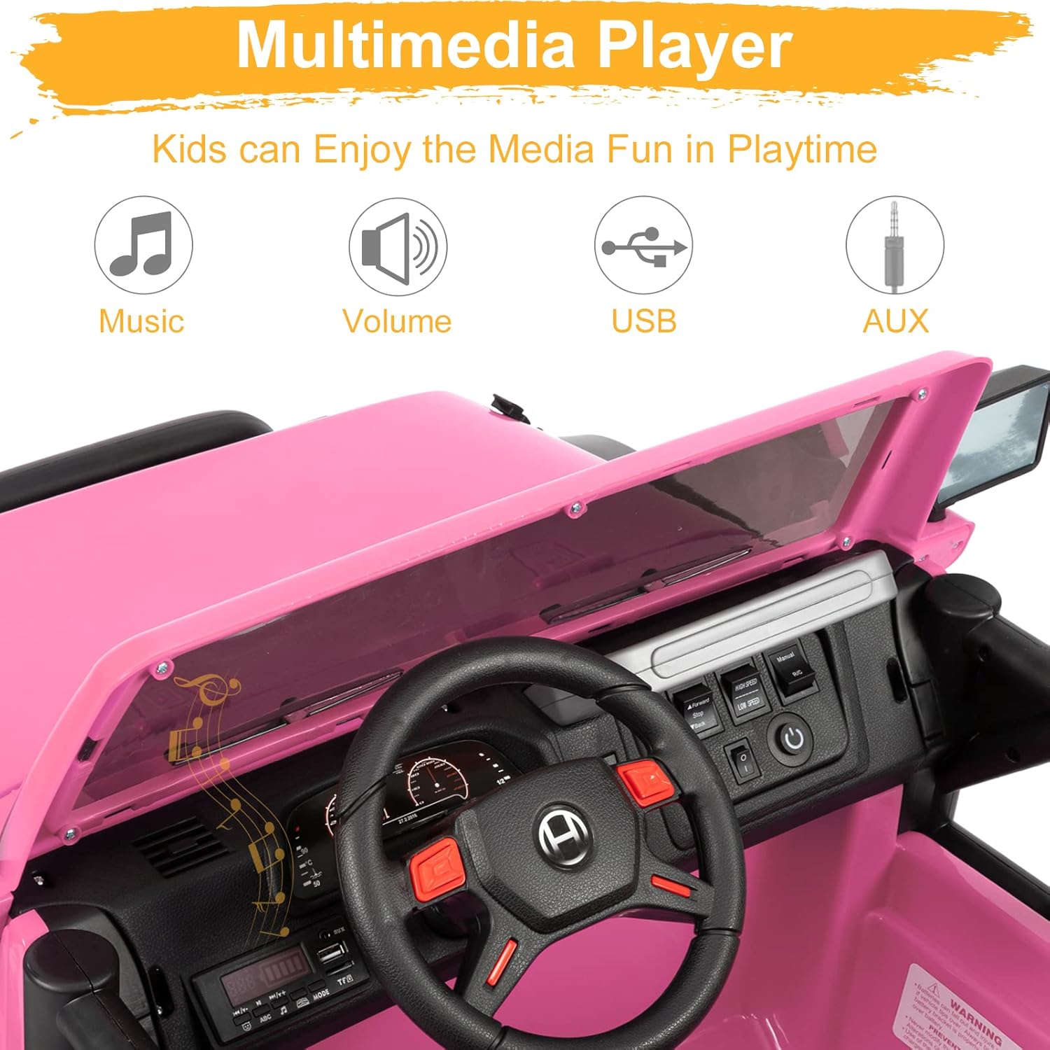 Close-up of the dashboard of the JOYMOR ride-on truck, showing controls for music, volume, USB, and AUX input.