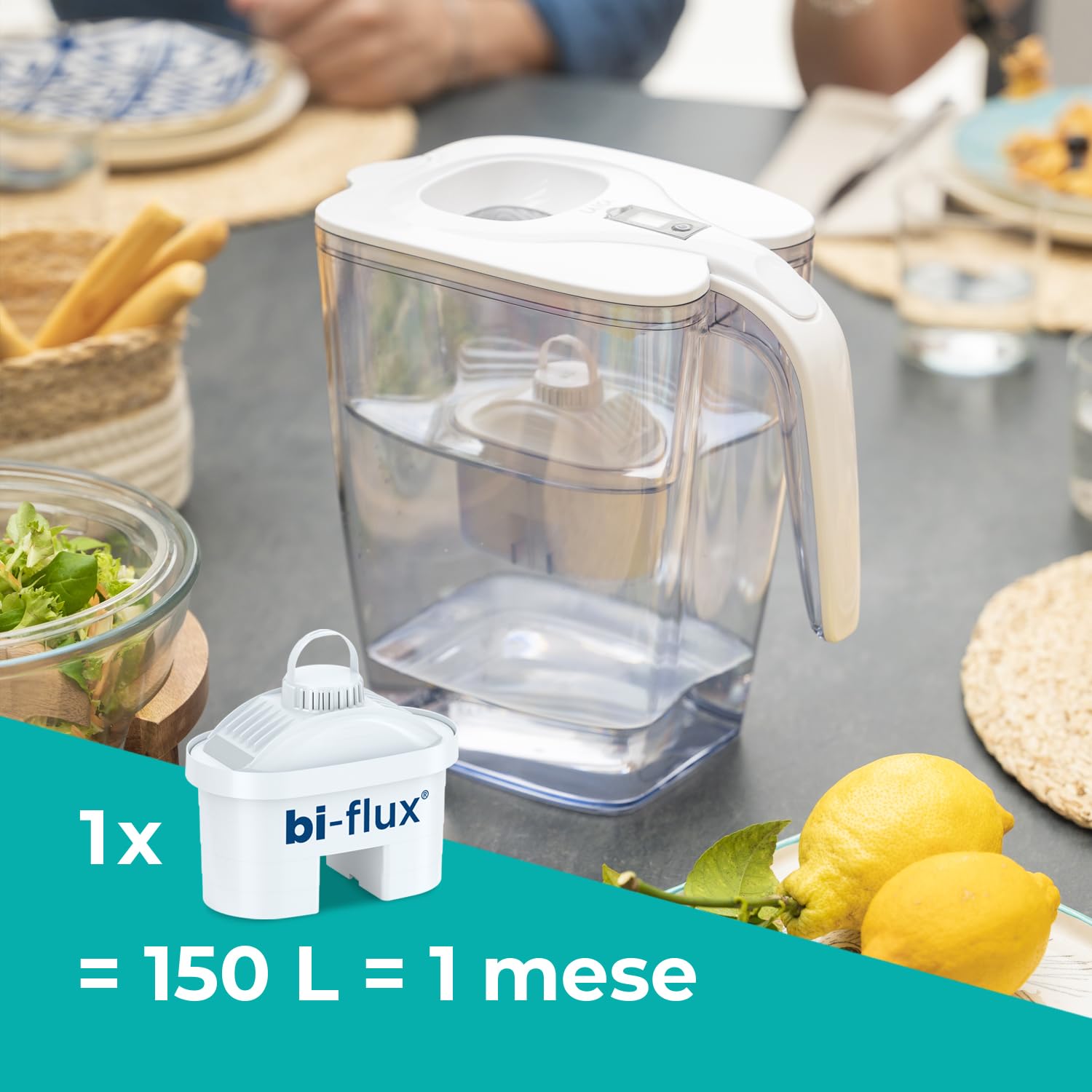 Laica Milan XXL Filter Carafe on a table with food, showing the filter cartridge and indicating 1 filter = 150L = 1 month.