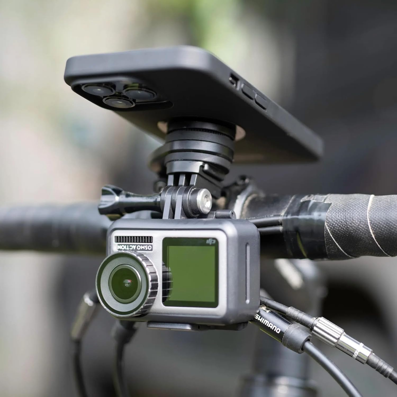 Action camera mounted below a smartphone on the SP Connect mount