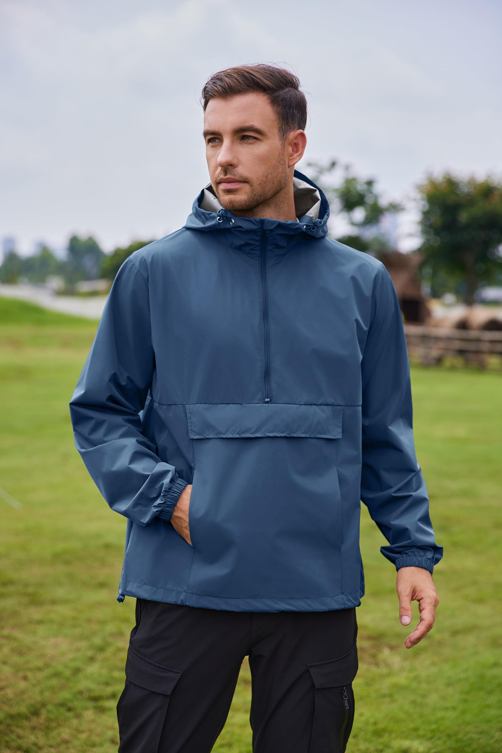 COOFANDY Giacca antipioggia da uomo impermeabile leggera ripiegabile pullover giacca a vento con cappuccio per escursionismo corsa