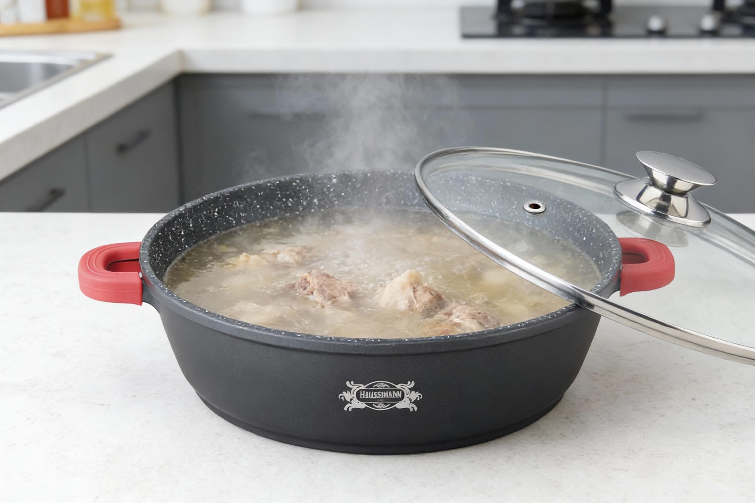 Haussmann Héritage Sauteuse Façon Pierre avec Couvercle Verre – Fonte d'Aluminium Induction & Four (260°C) – Poignées Silicone Isolantes – Grande Capacité pour Cuisine Familiale (40cm/9cm/10L)