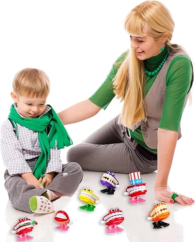 Miniatura 8 de Paquete de 7 juguetes de cuerda con dientes parloteadores, surtido de juguetes de dientes que muerden, mini juguetes de relojería para saltar y