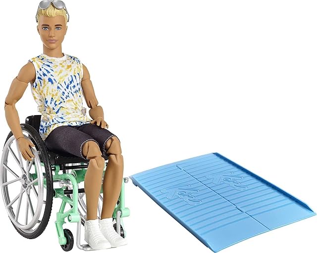 Ken Fashionista Doll #167 with Wheelchair & Ramp Wearing Tie-Dye Shirt, Black Shorts, White Sneakers & Sunglasses, Toy for Kids 3 to 8 Years Old - GWX93