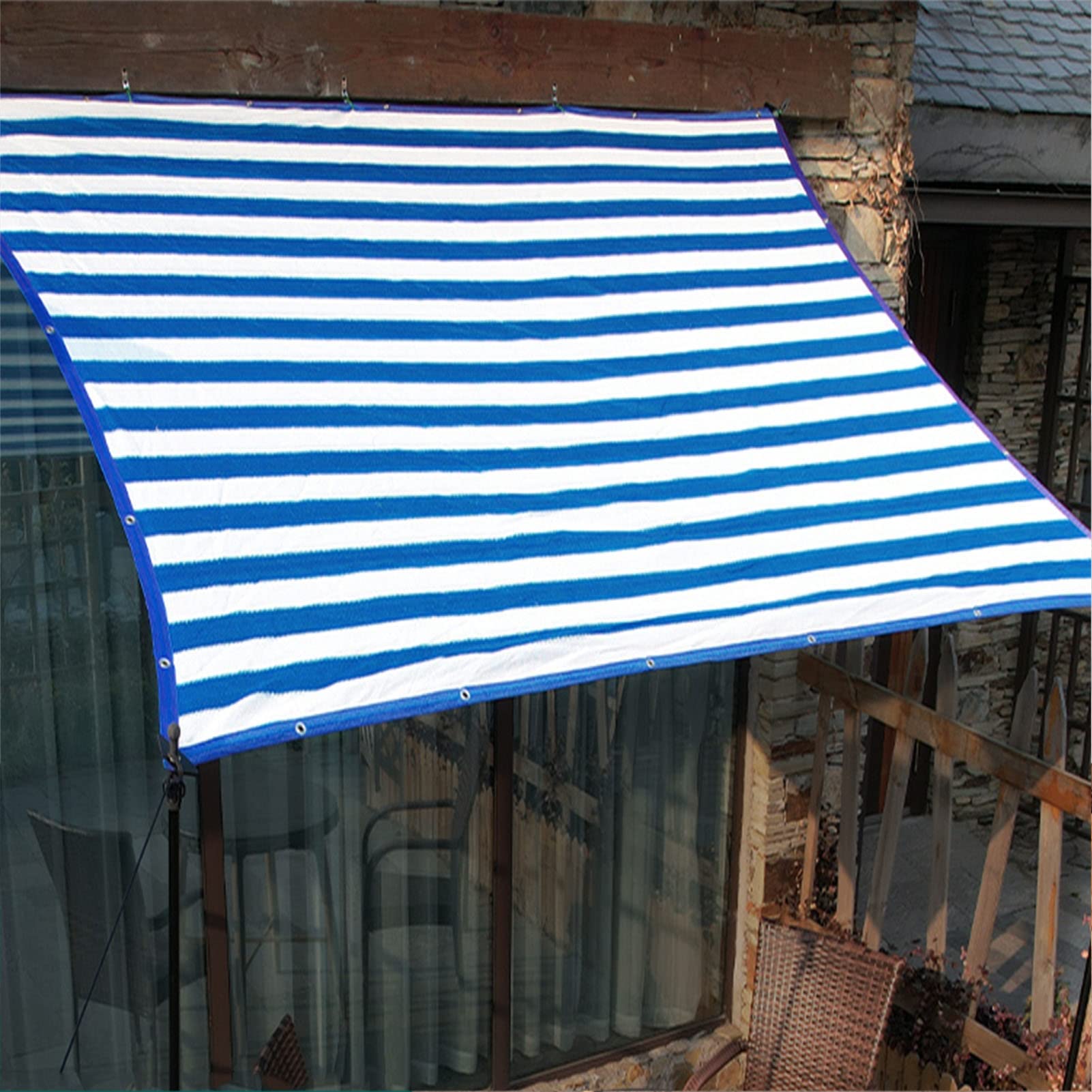 Voile d'ombrage pour terrasse à rayures bleues : créez votre coin d'ombre
