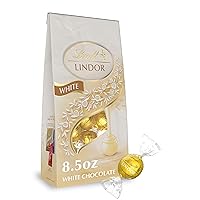 Vista 1 de Lindt LINDOR Trufas de caramelo de chocolate blanco, chocolates con centro de trufa suave y derretida, bolsa de 8.5 onzas
