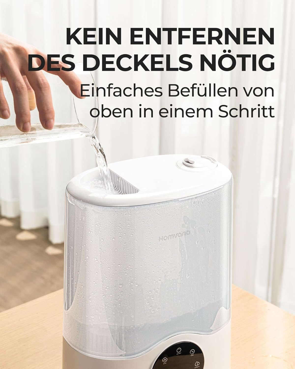 A hand pouring water into the top-fill opening of the Homvana Smart Humidifier H112, demonstrating the easy refill process without removing the lid.