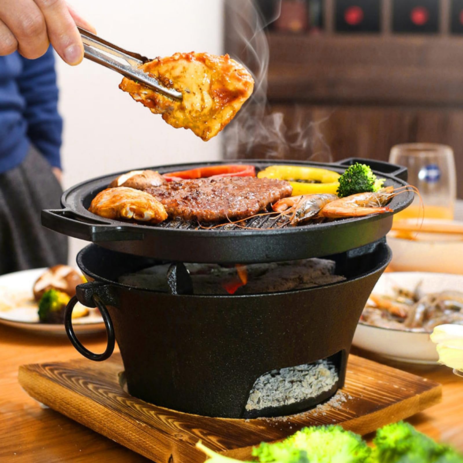 Mały żeliwny okrągły palenisko grill grill piec - sprzęt do gotowania na świeżym powietrzu na piknik kempingowy i grille na podwórku