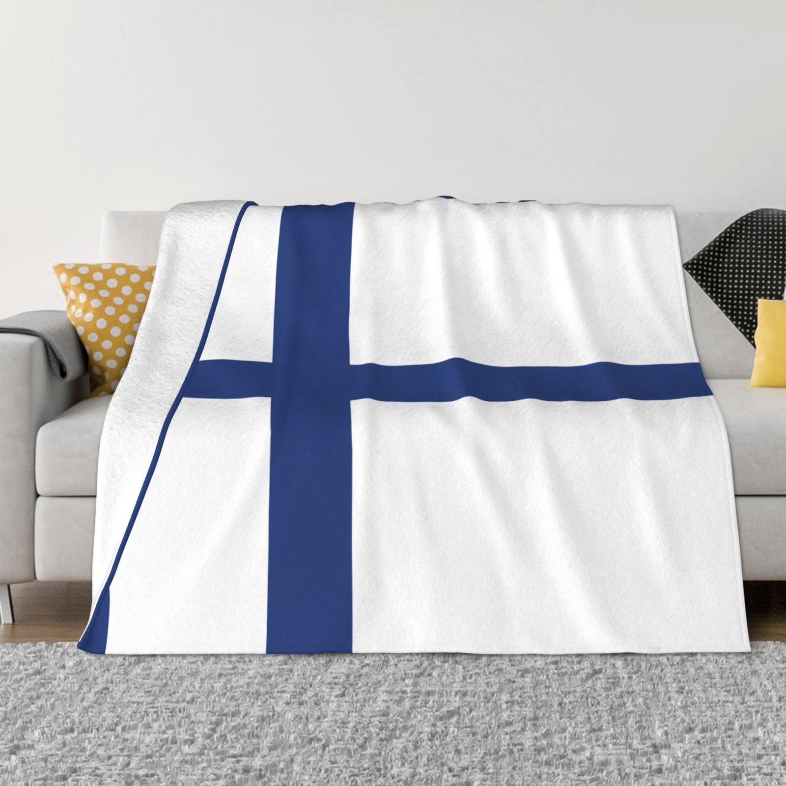 Couverture flanelle Finlande pour soirées cocooning sur le canapé du salon