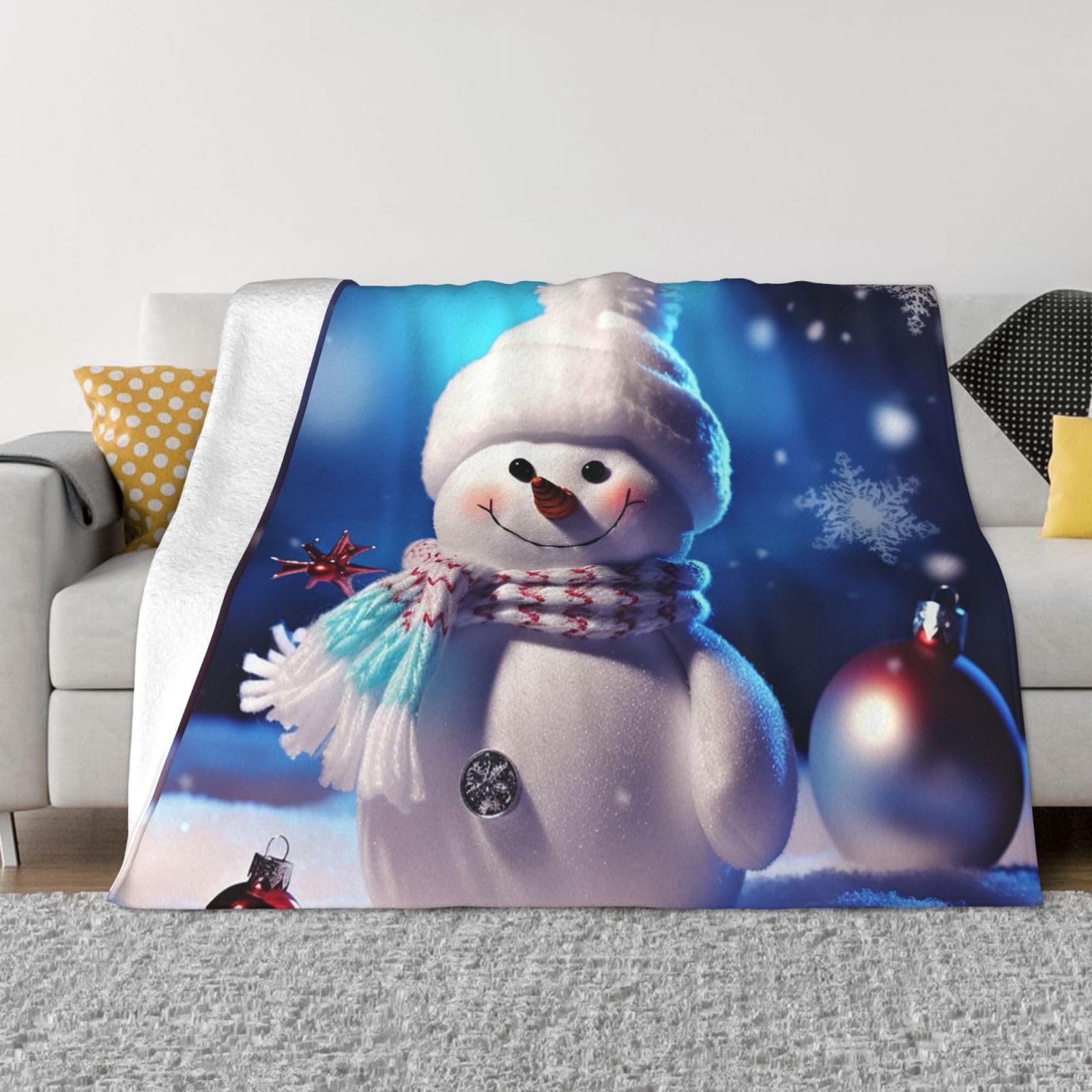 Couverture en flanelle bonhomme de neige : l'allié des soirées cocooning sur le canapé