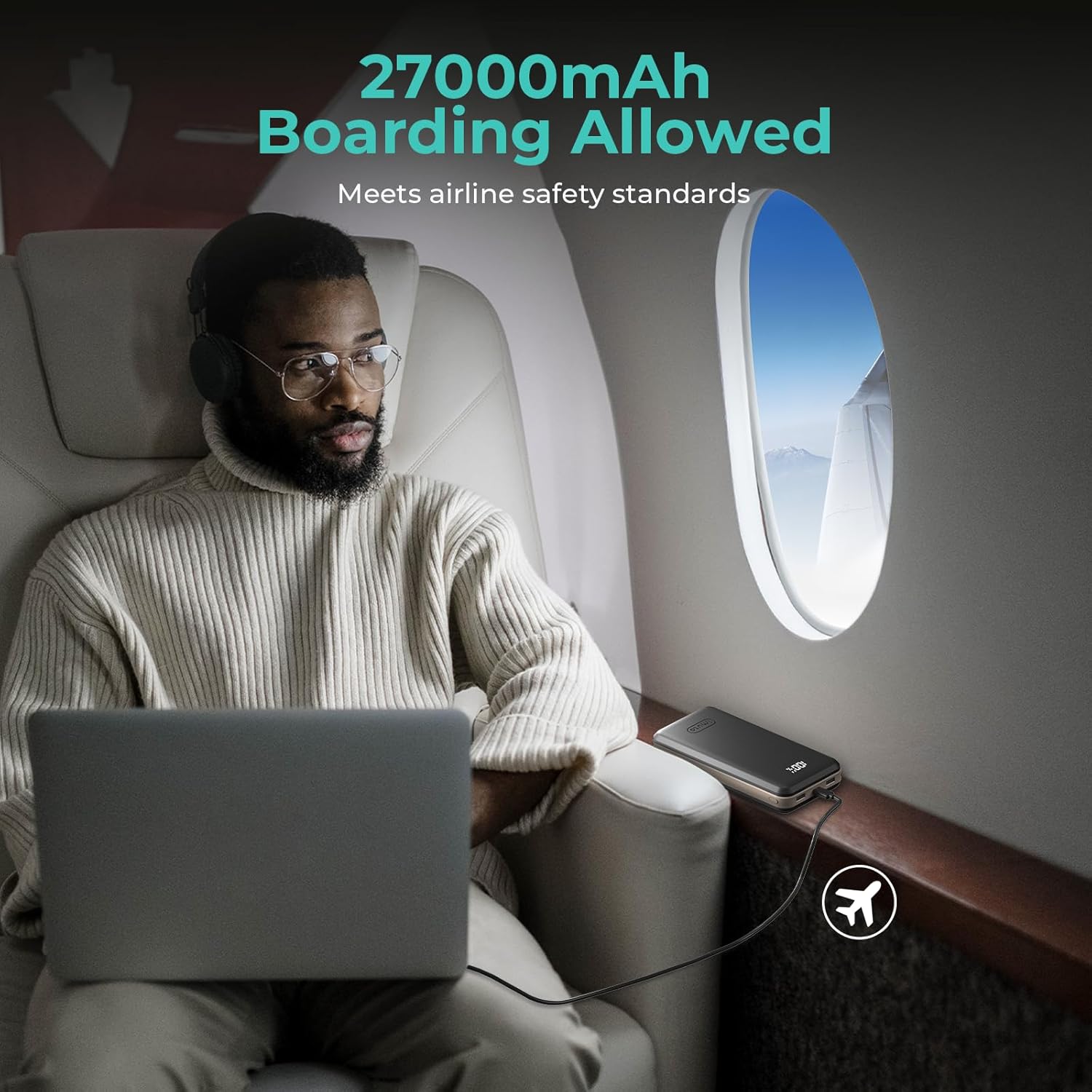 Man using imuto X30 Power Bank on an airplane, indicating airline safety compliance
