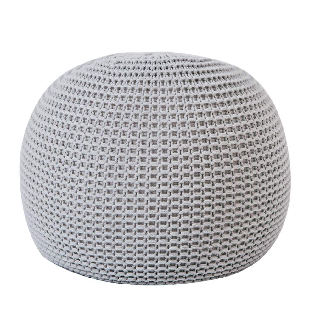 Pouf repose-pieds rond pour un coin lecture cosy et chaleureux
