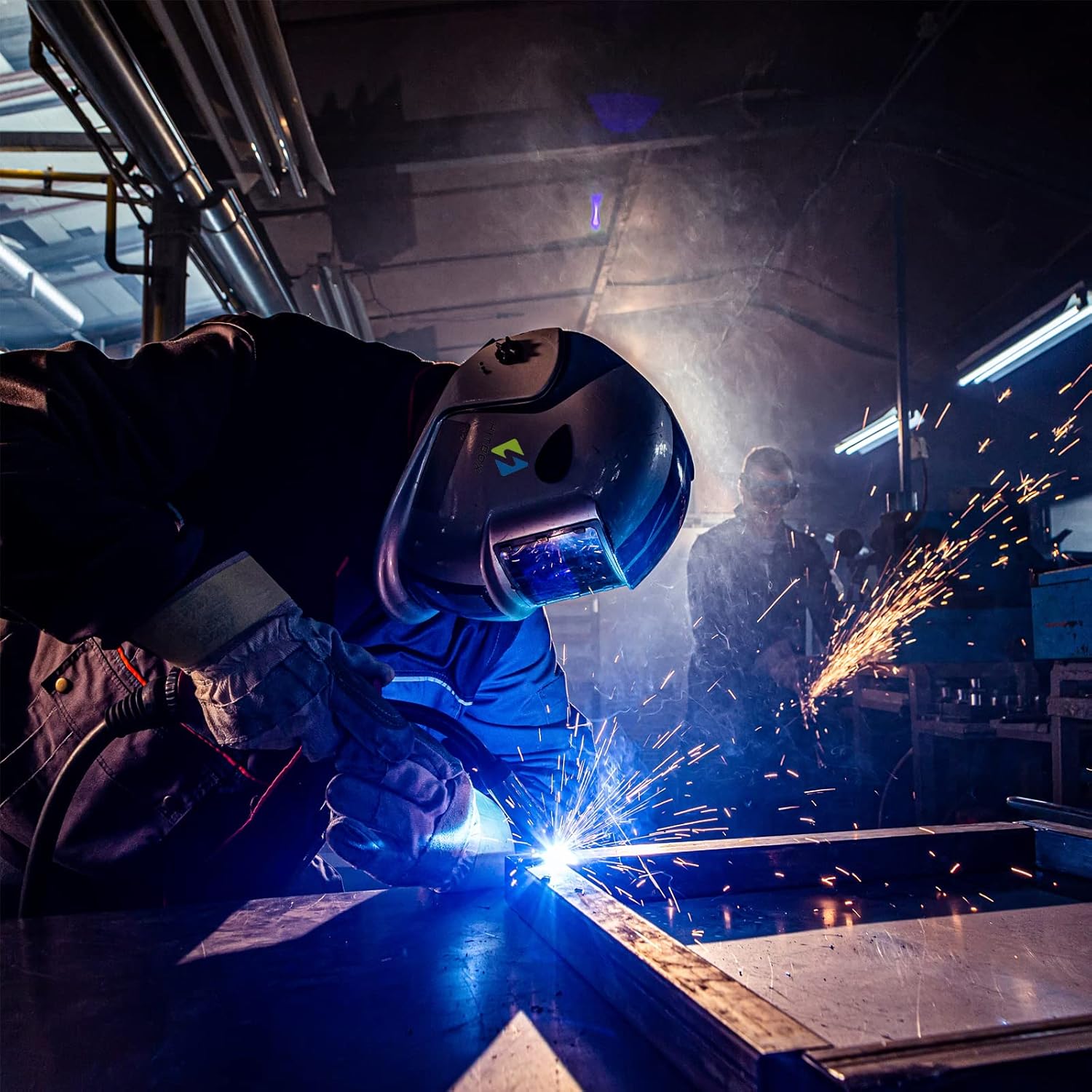 Welder performing MIG welding