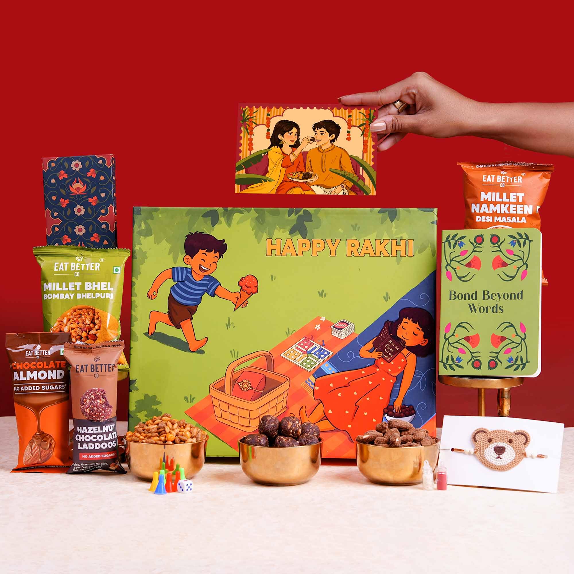 Rakhi Gift Hamper for Brother – 10-Item Celebration Gift with UNO & LUDO, Dry-Fruit Chocolate Laddoos, Namkeens, Evil-Eye Rakhi & Roli-Chawal | Raksha Bandhan Combo Gift for Kids, Adults & Family-image-8