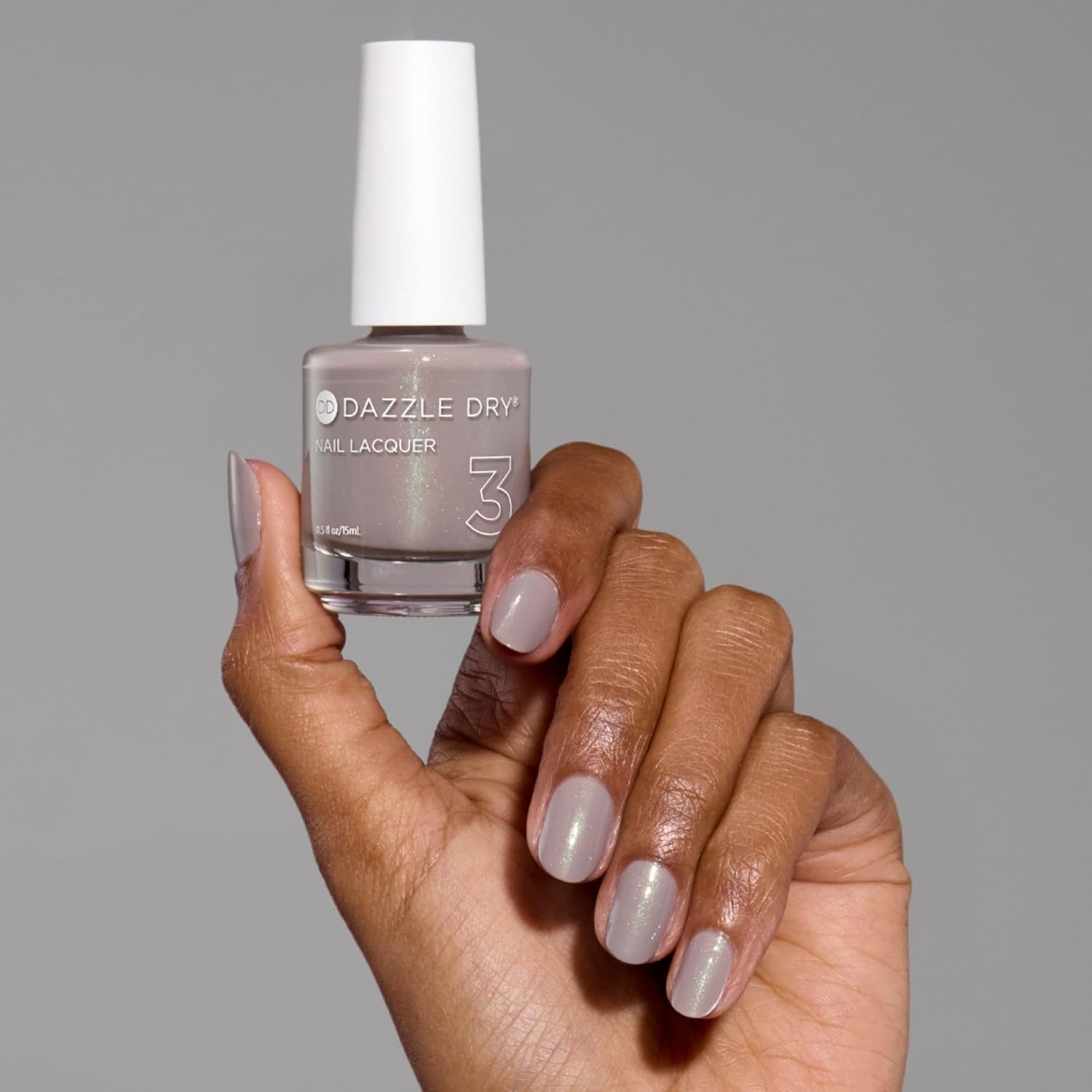 Dazzle Dry Nail Lacquer (Step 3) - Let's Glow - A light purple taupe with a subtle green shimmer. Semi-sheer. Shimmer. (0.5 fl oz)
