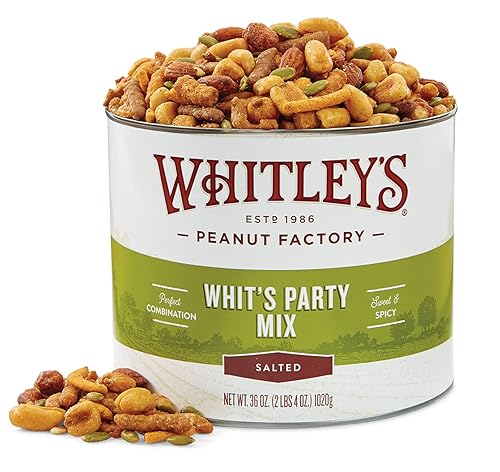 Whitley's 'Whit's Party Mix' - Mezcla de aperitivos dulces y picantes, palitos de sésamo, nueces de maíz, palitos cajún y nueces (lata de 36 onzas)