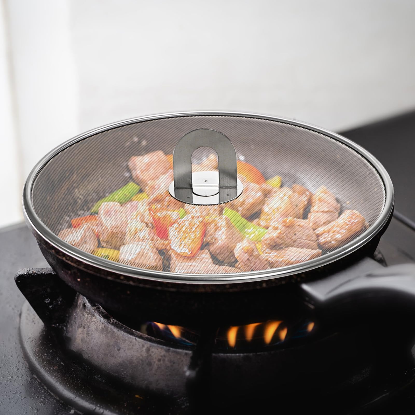 This Splatter Screen Means a Quicker Cleanup and Crispier Food | Bon Appétit
