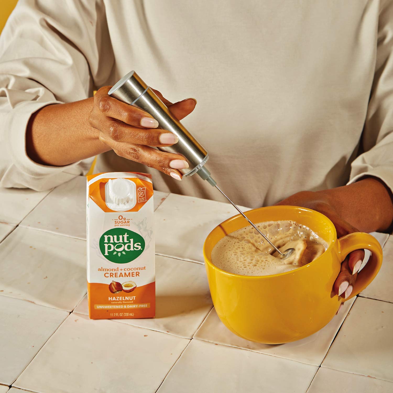 nutpods Non Dairy Coffee Creamer Bundle: a 4 pack of French Vanilla creamer and a 4 pack of Hazelnut creamer.