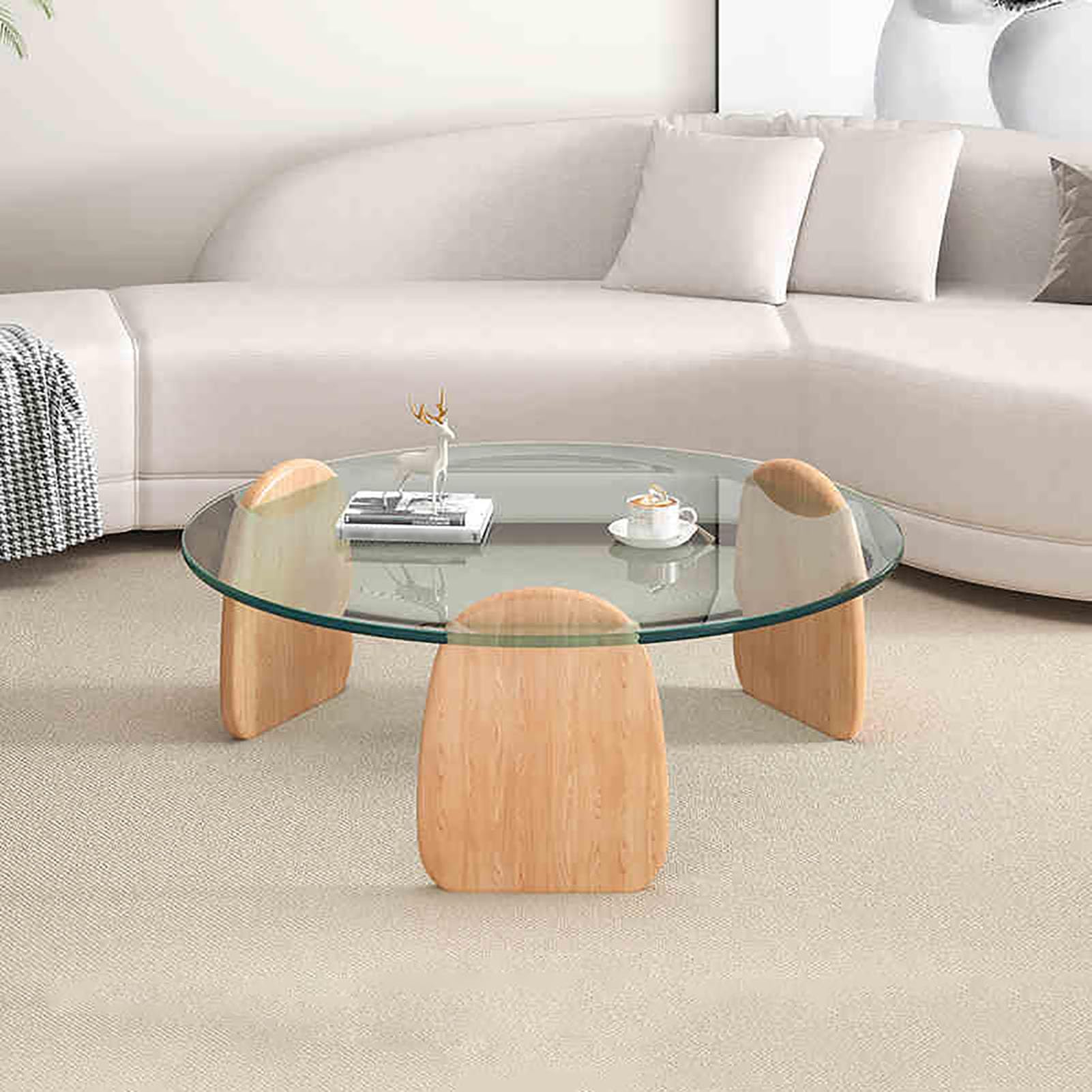 Table basse ronde en verre et bois pour un salon chaleureux et minimaliste