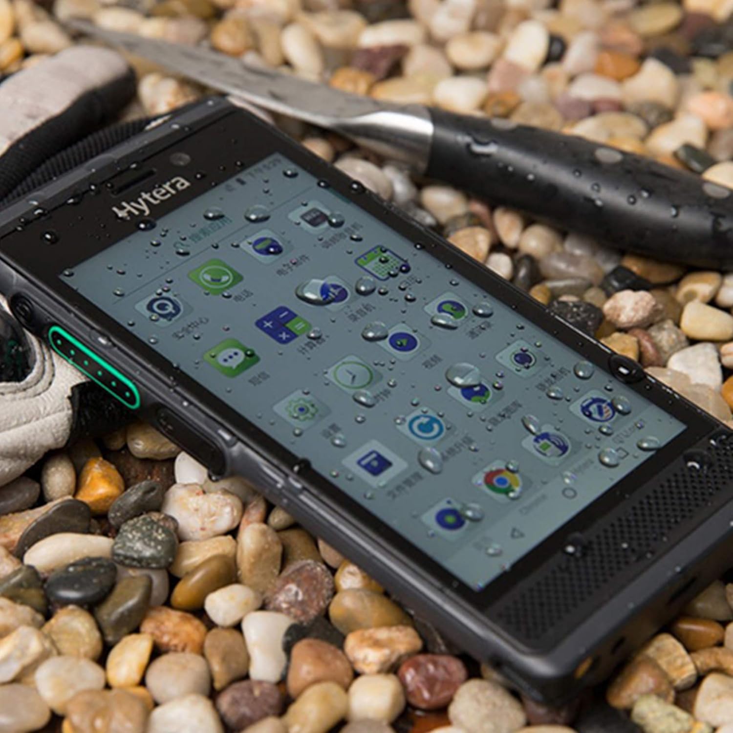 Hytera PNC550 with water droplets on its screen, demonstrating IP68 rating