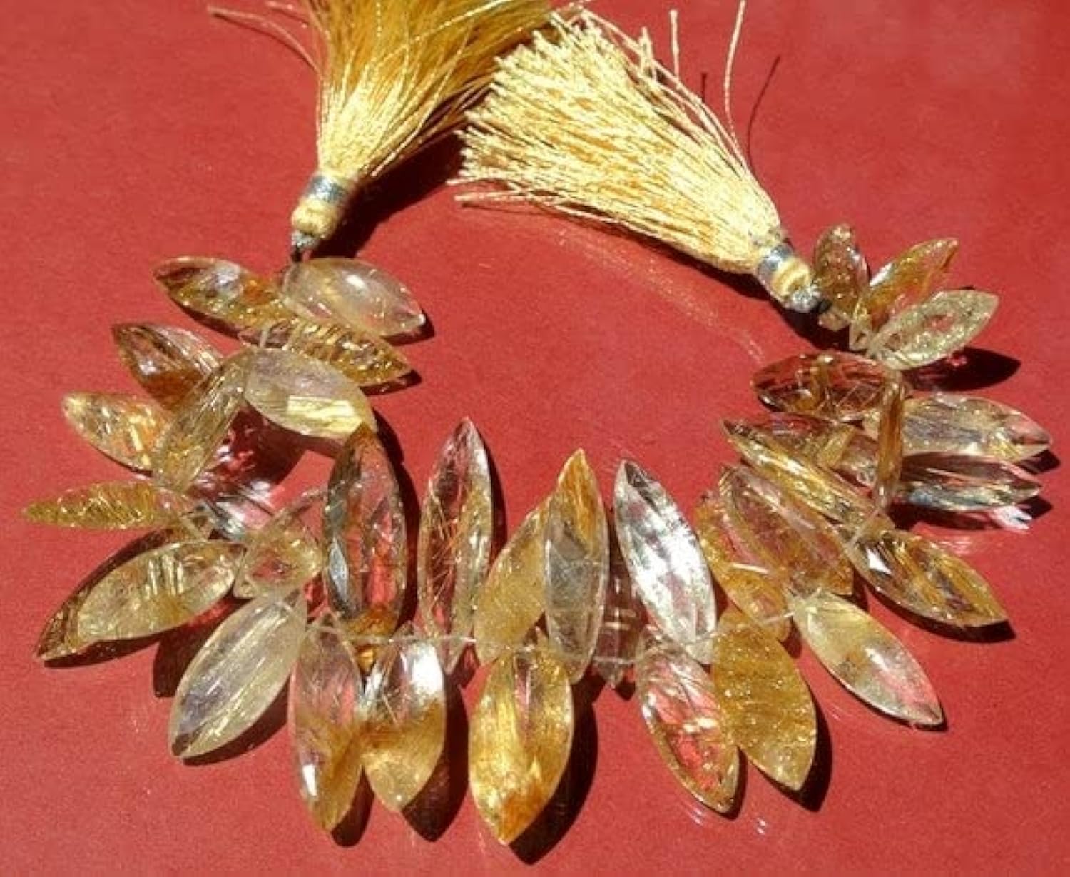 Quartz rutilé doré résoud vos manques d'éclat pierres marquises facettées