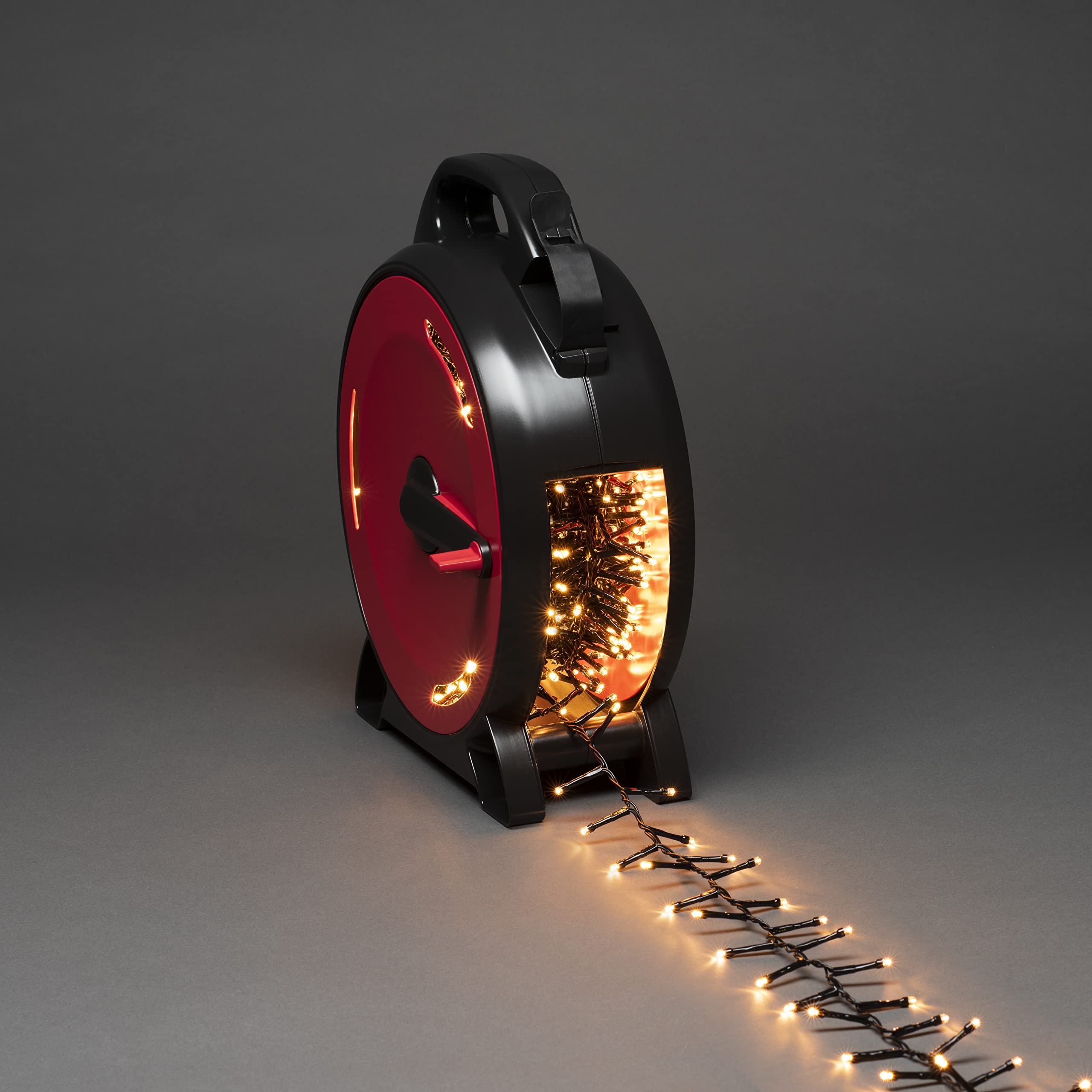 Konstsmide Micro LED Compactlights 3850-800 - Cable retráctil (1200 diodos ámbar, 30 V, exterior (IP44), cable negro)