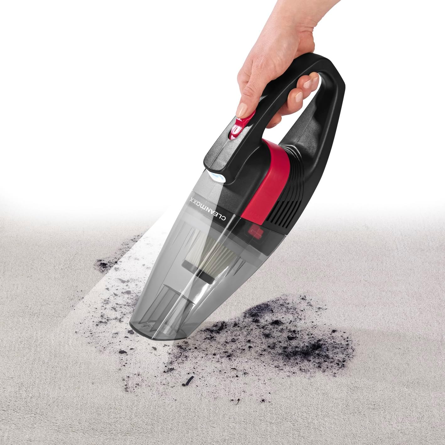 CLEANmaxx handheld vacuum with LED light illuminating dirt on a carpet.