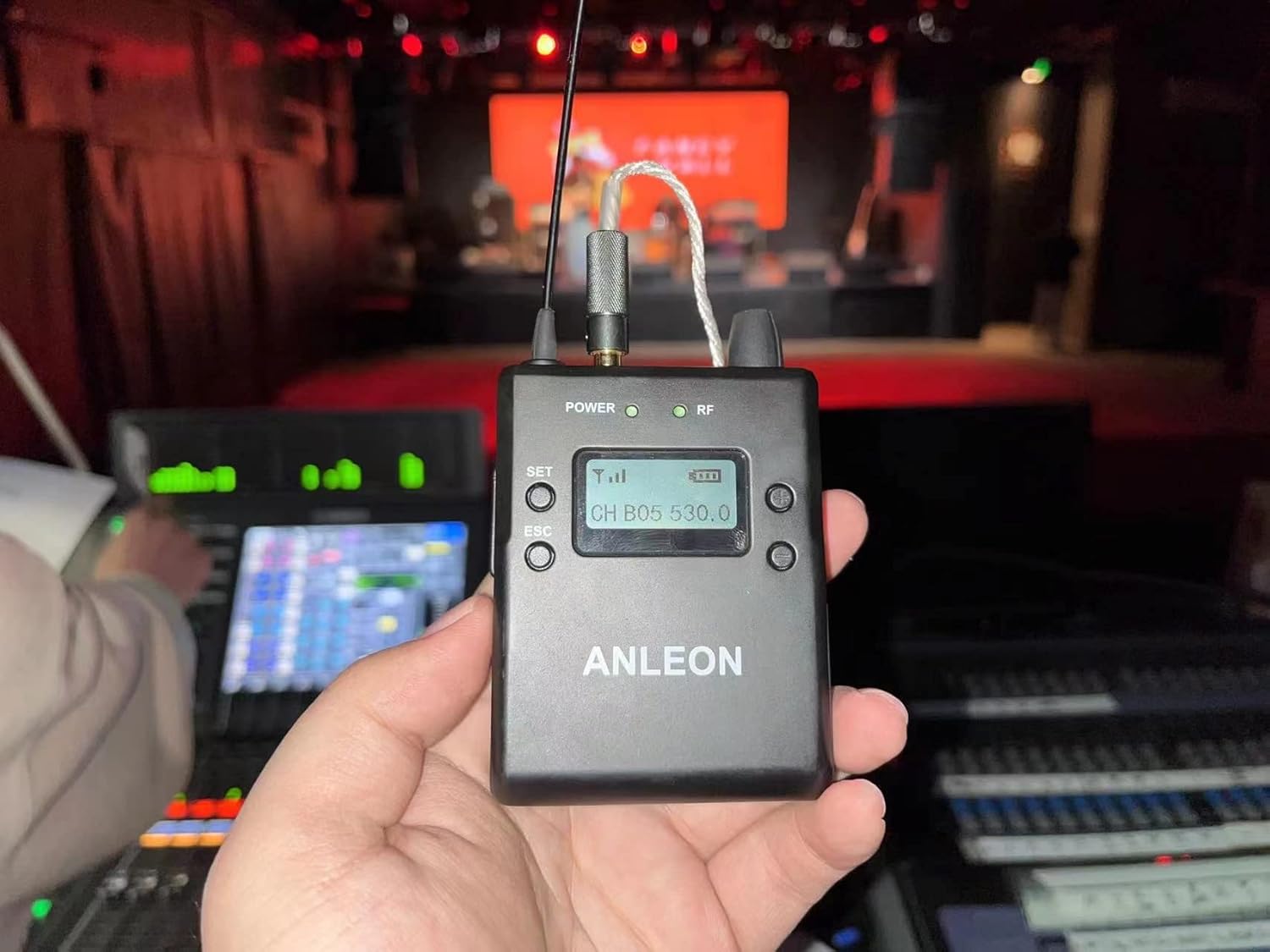 Hand holding ANLEON S3 Body-Pack Receiver