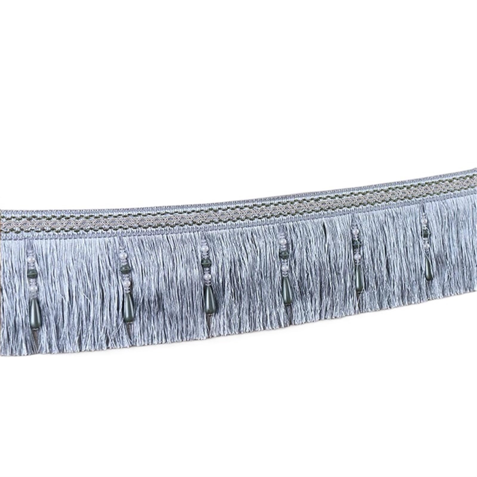 Trenza de flecos con borlas para rematar bordes deshilachados en tapicería casera