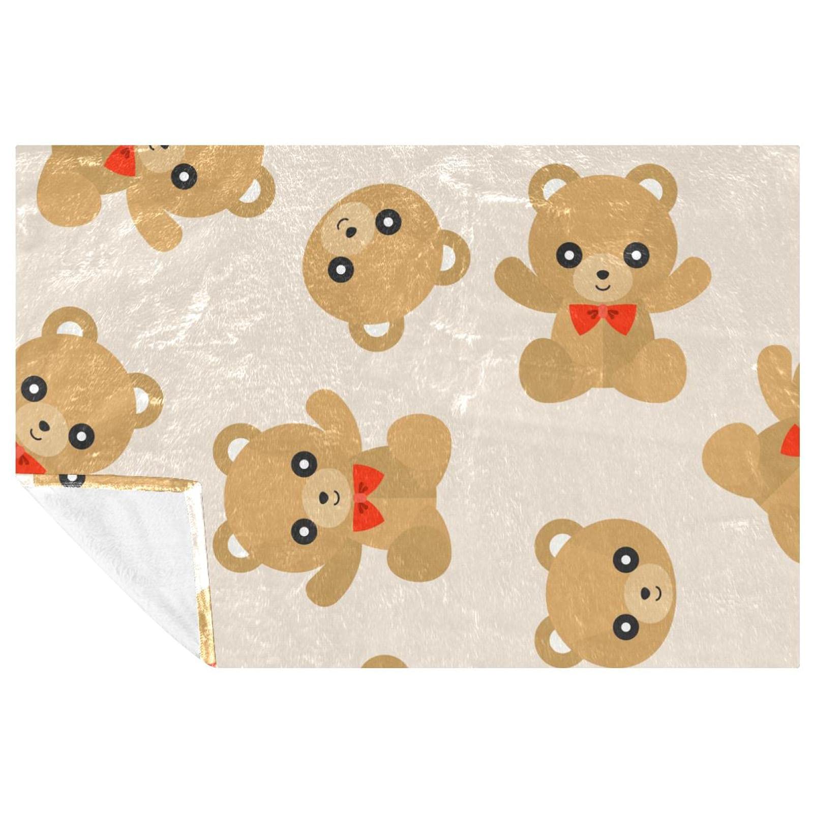 Couverture douce ours en peluche contre le froid sur le canapé ou au lit