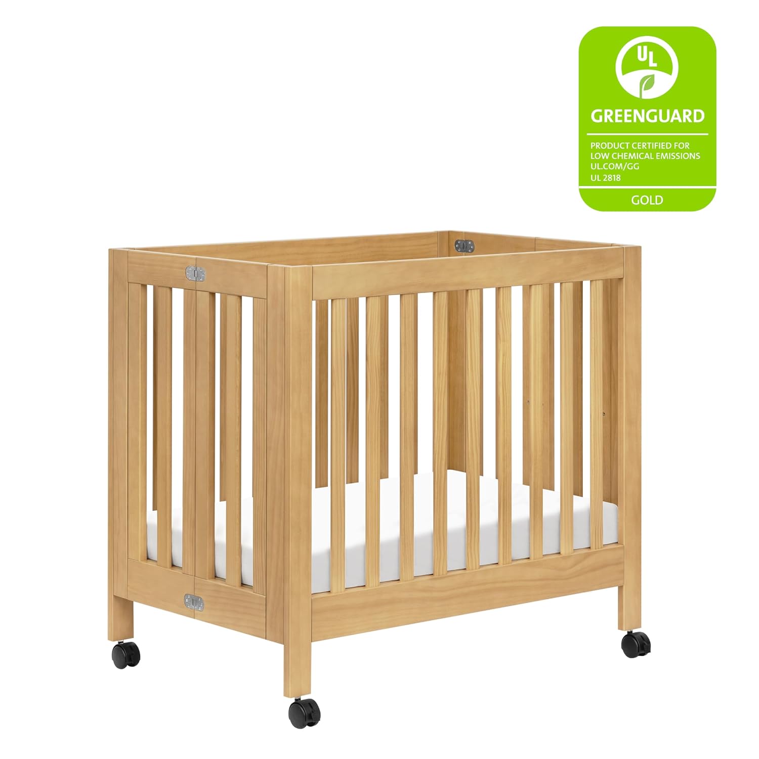 Babyletto Origami Mini Crib with Wheels - GREENGUARD Gold Certified - Portable Baby Crib for Small Spaces - Foldable & Converts to Twin Bed - Easy Setup - 2 Adjustable Mattress Positions - Honey