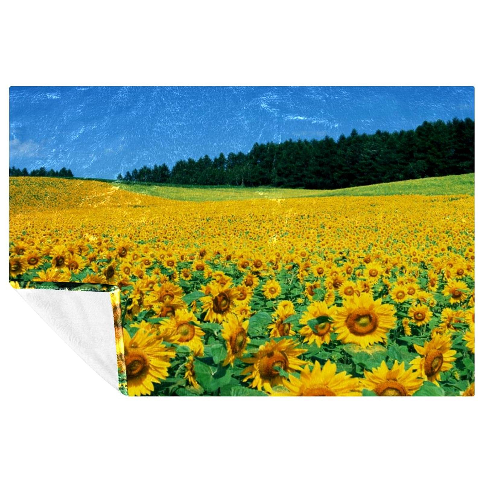 Couverture douce chaude tournesol 150x100 : finis les frissons sur votre canapé ou lit