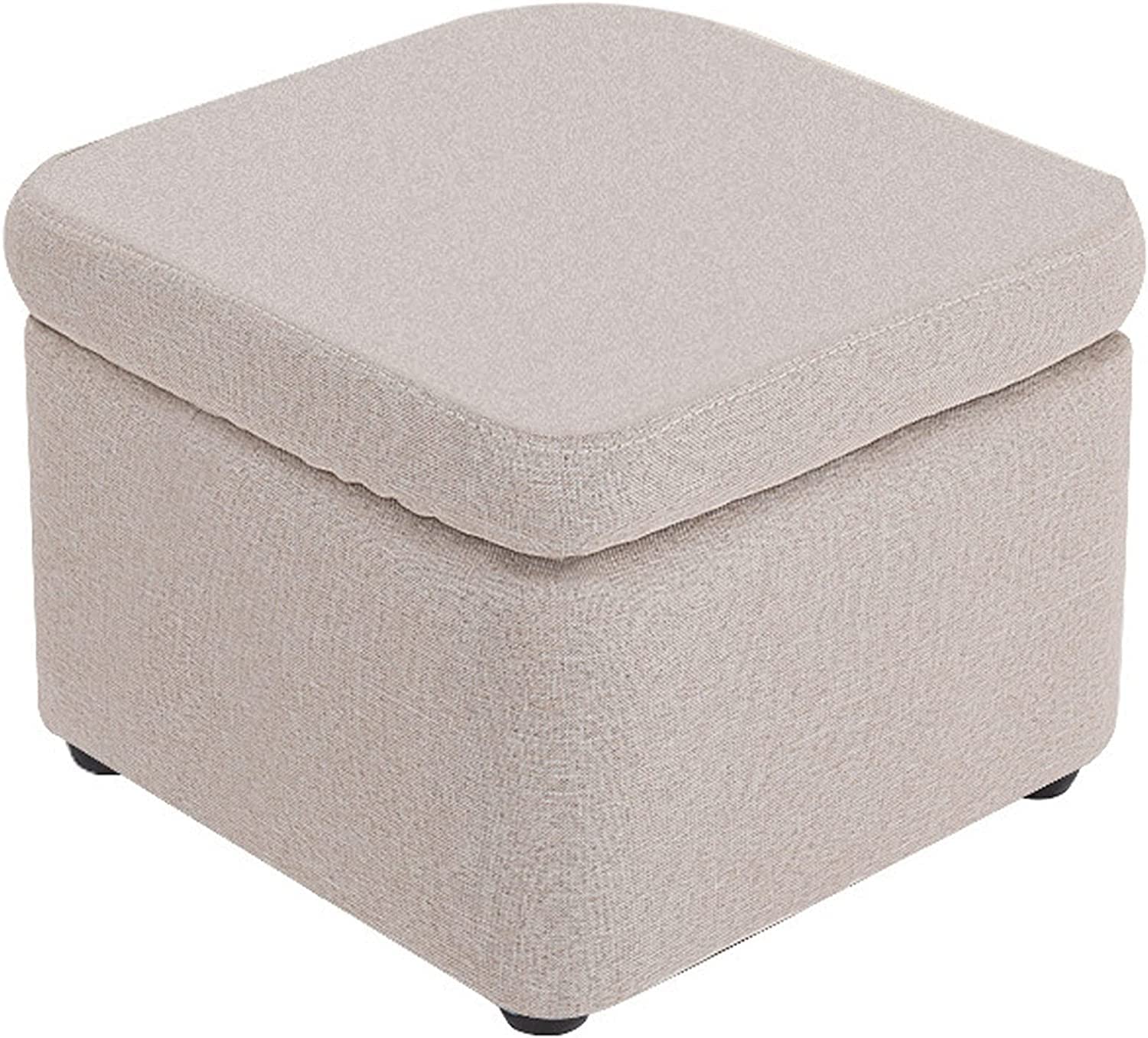 Repose-pieds de rangement beige pour éliminer le désordre dans la chambre