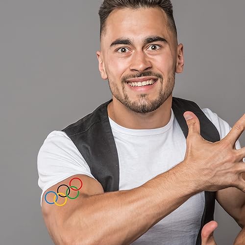 Miniatura 2 de FashionTats Tatuajes temporales de anillos olímpicos  Paquete de 25  Seguro para la piel  Fabricado en los Estados Unidos  Desmontable