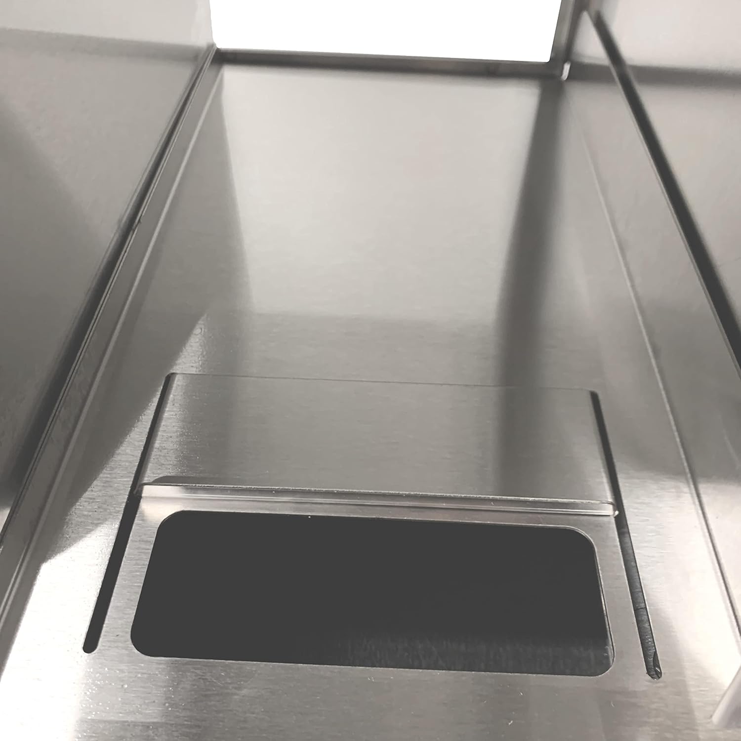 Close-up of the water fill slot inside the steamer