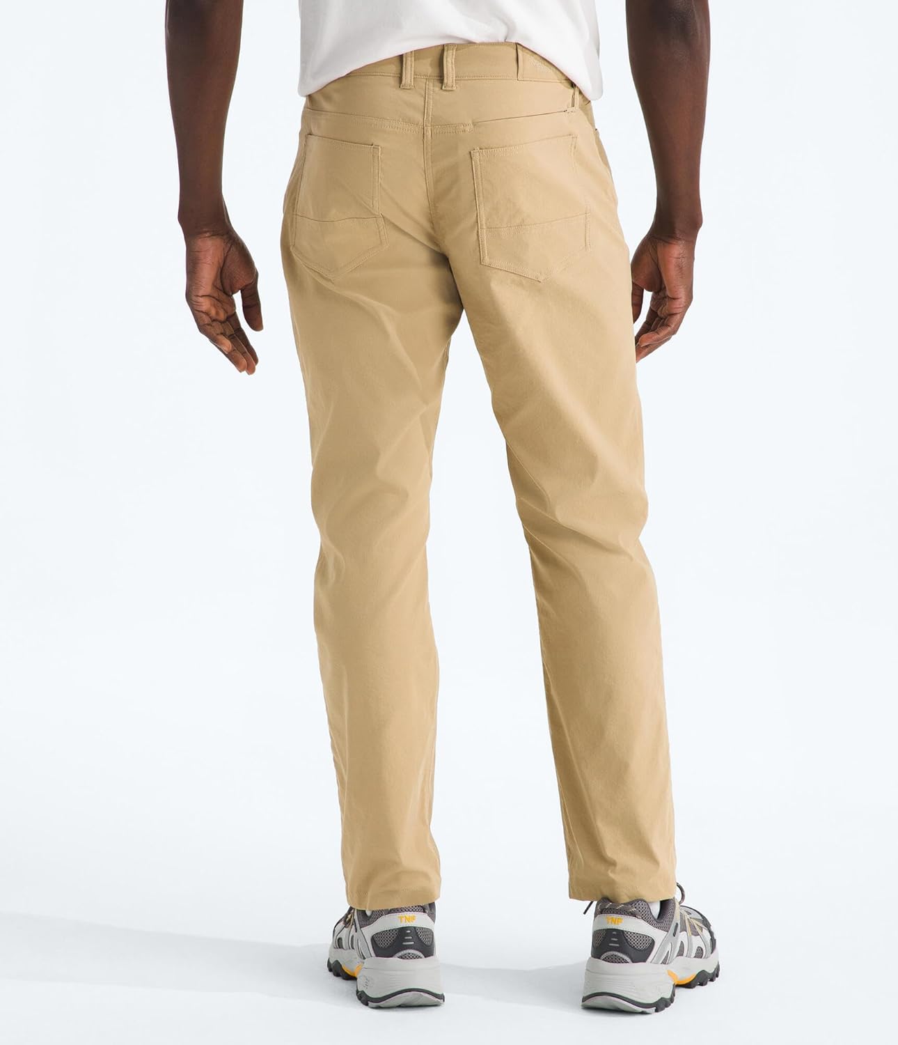 Back view of The North Face Men's Sprag 5-Pocket Pant in beige on a model