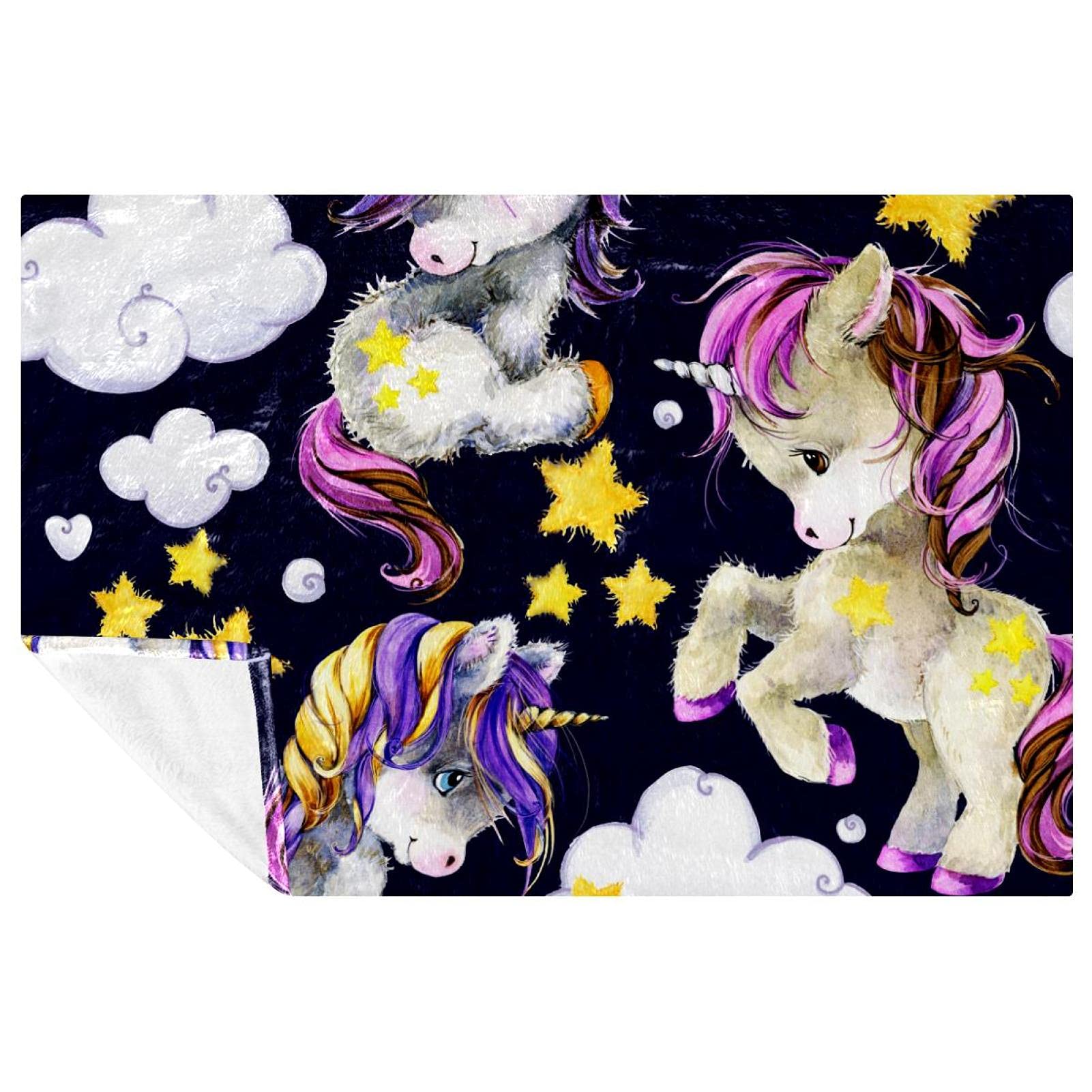 Couverture licorne violette contre le froid sur le canapé et en pique-nique