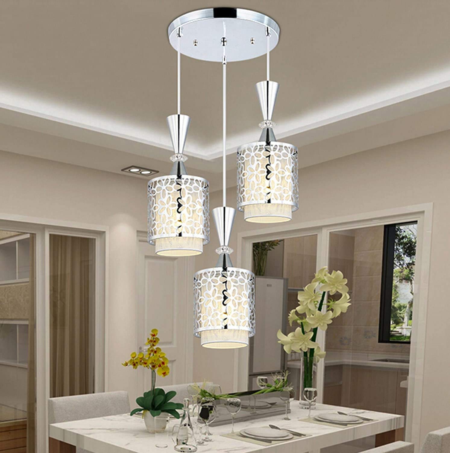 Luces colgantes de comedor moderno con tecnología led y tres cabezas de acero