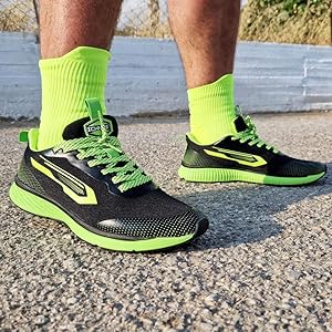 nike black and lime green running shoes