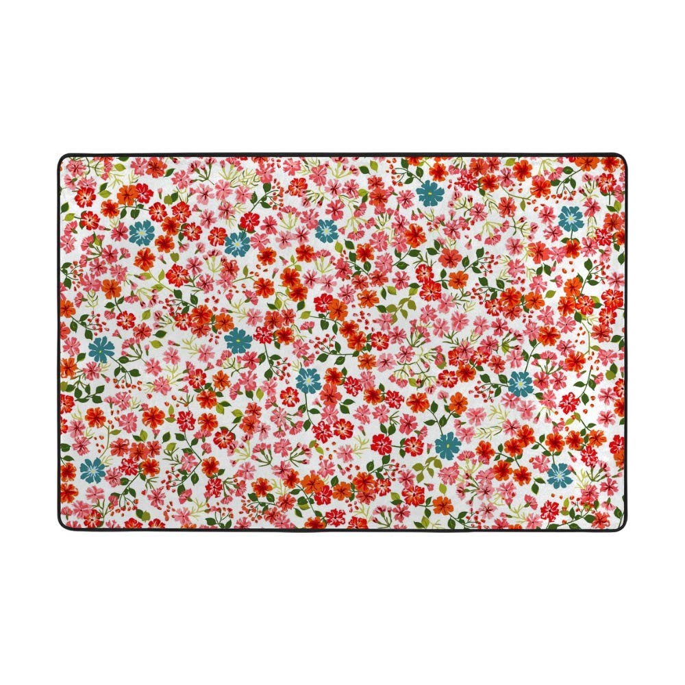 Grand tapis floral rouge en velours pour créer un salon chaleureux et cosy