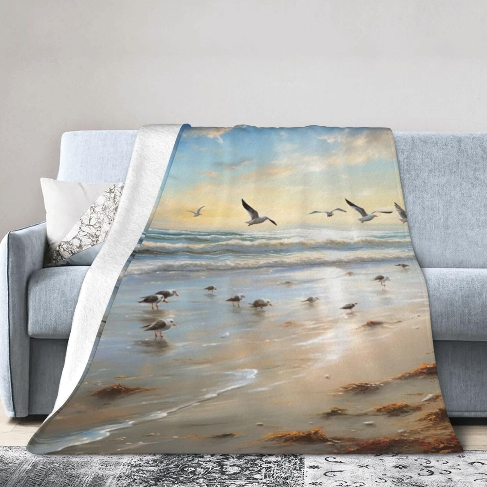 Plaid canapé motif plage en couverture polaire douce pour soirées cocooning