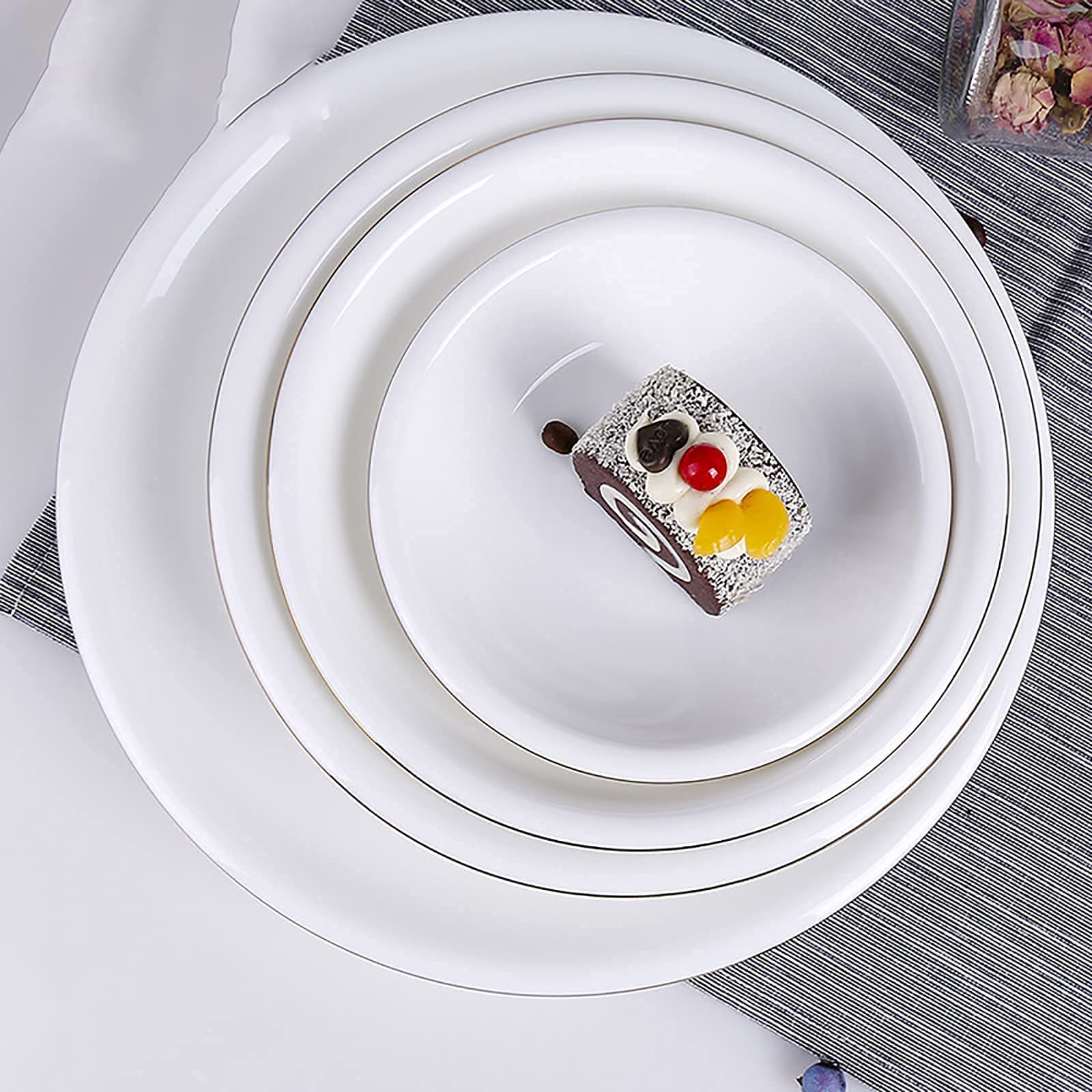 28-częściowy zestaw zastawy stołowej z porcelany kostnej – elegancka porcelanowa zastawa stołowa ze złotą krawędzią zawiera okrągłe miski na płatki i talerze obiadowe dla 8 osób, idealna do domu i
