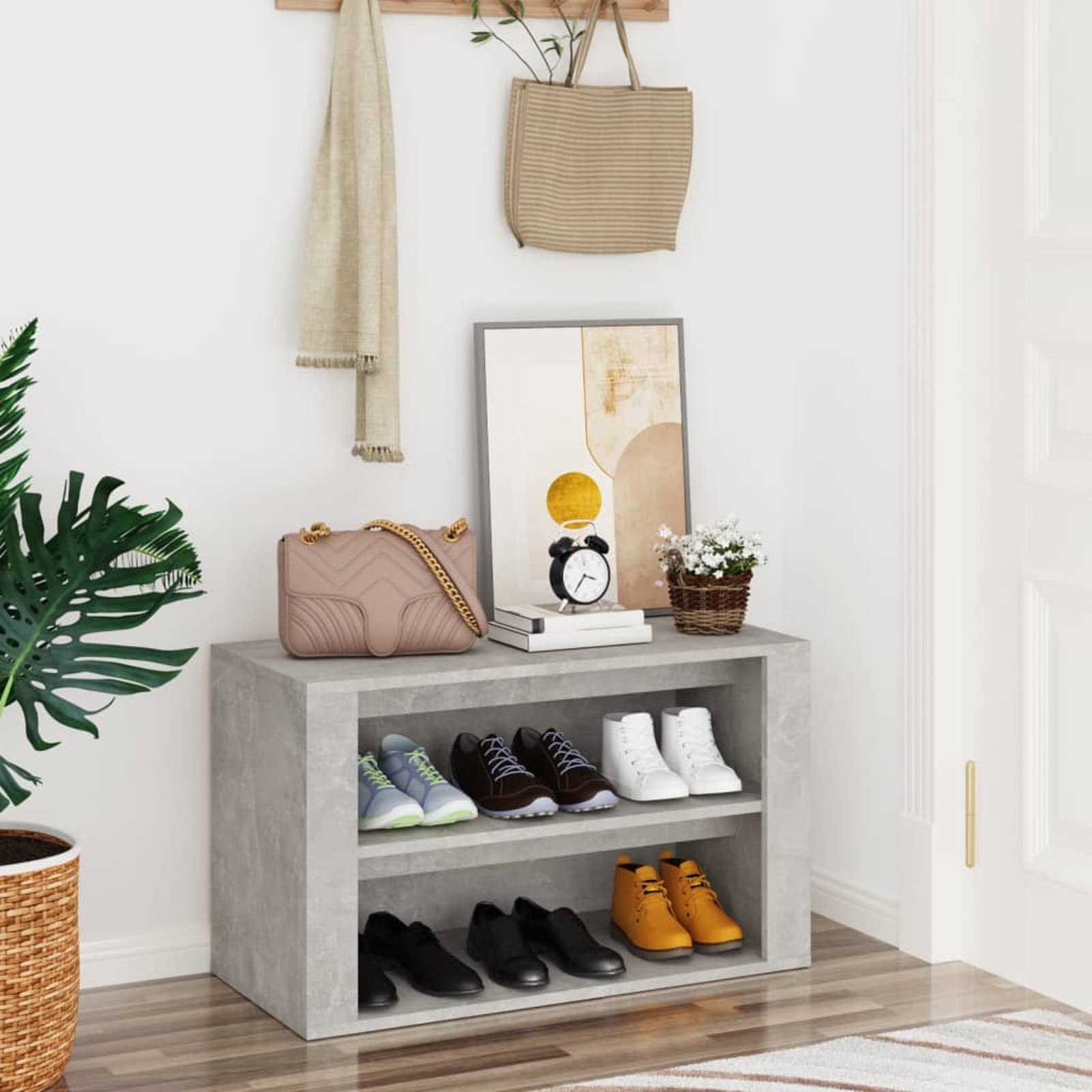 Organisateur de rangement de chaussures gris béton idéal pour une entrée soignée et accueillante