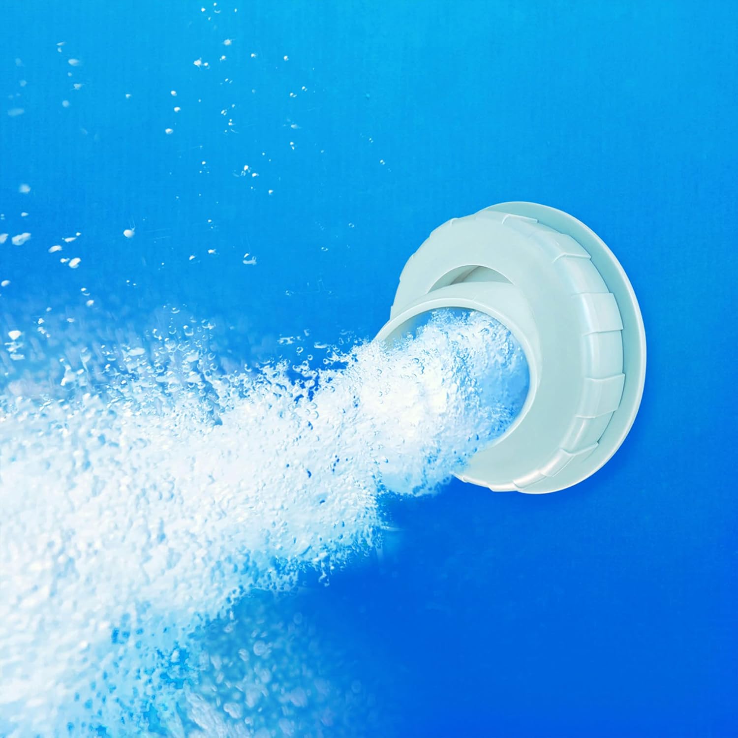 Water being returned to the pool from the filter pump outlet, creating bubbles.