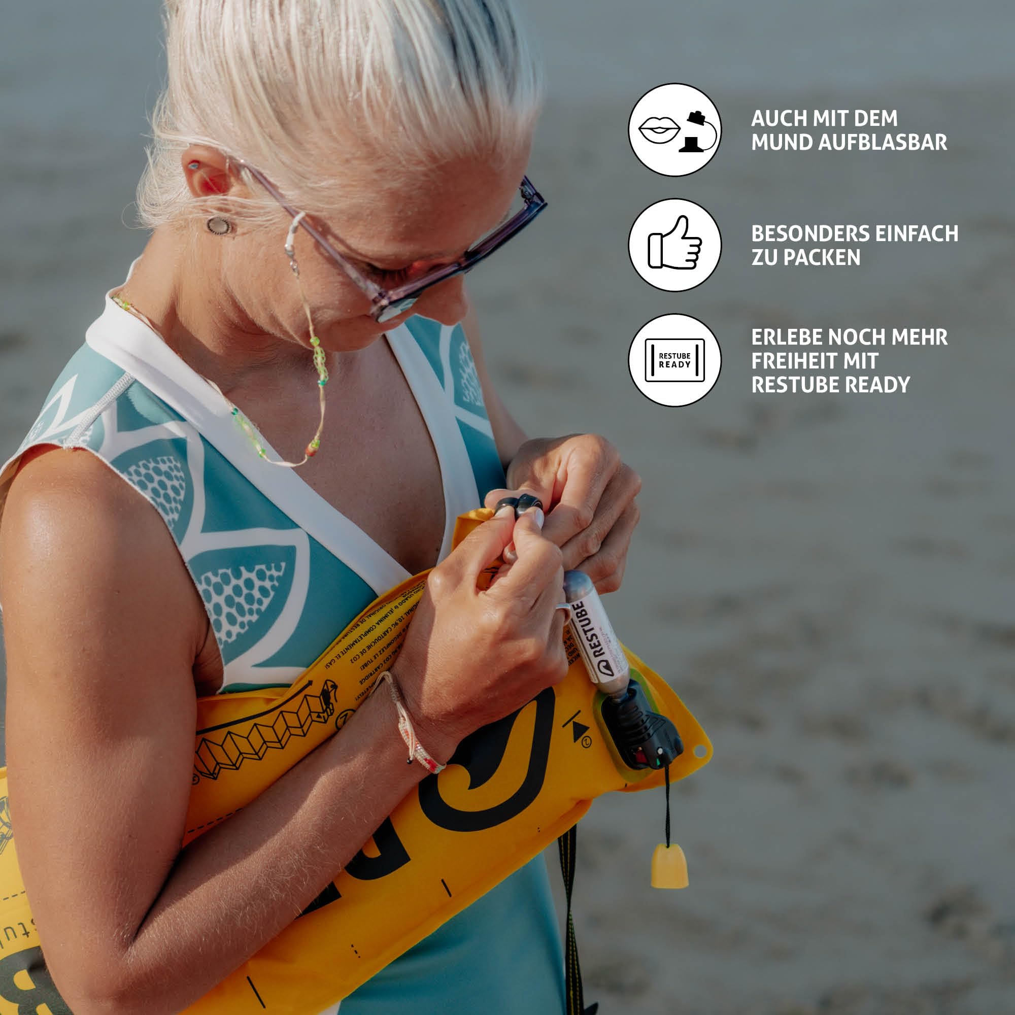 Restube Beach Schwimmboje-Starterbundle | Enthält eine aufblasbare Rettungsboje, 2 CO2-Ersatzpatronen und wasserfestes reflektierendes Band