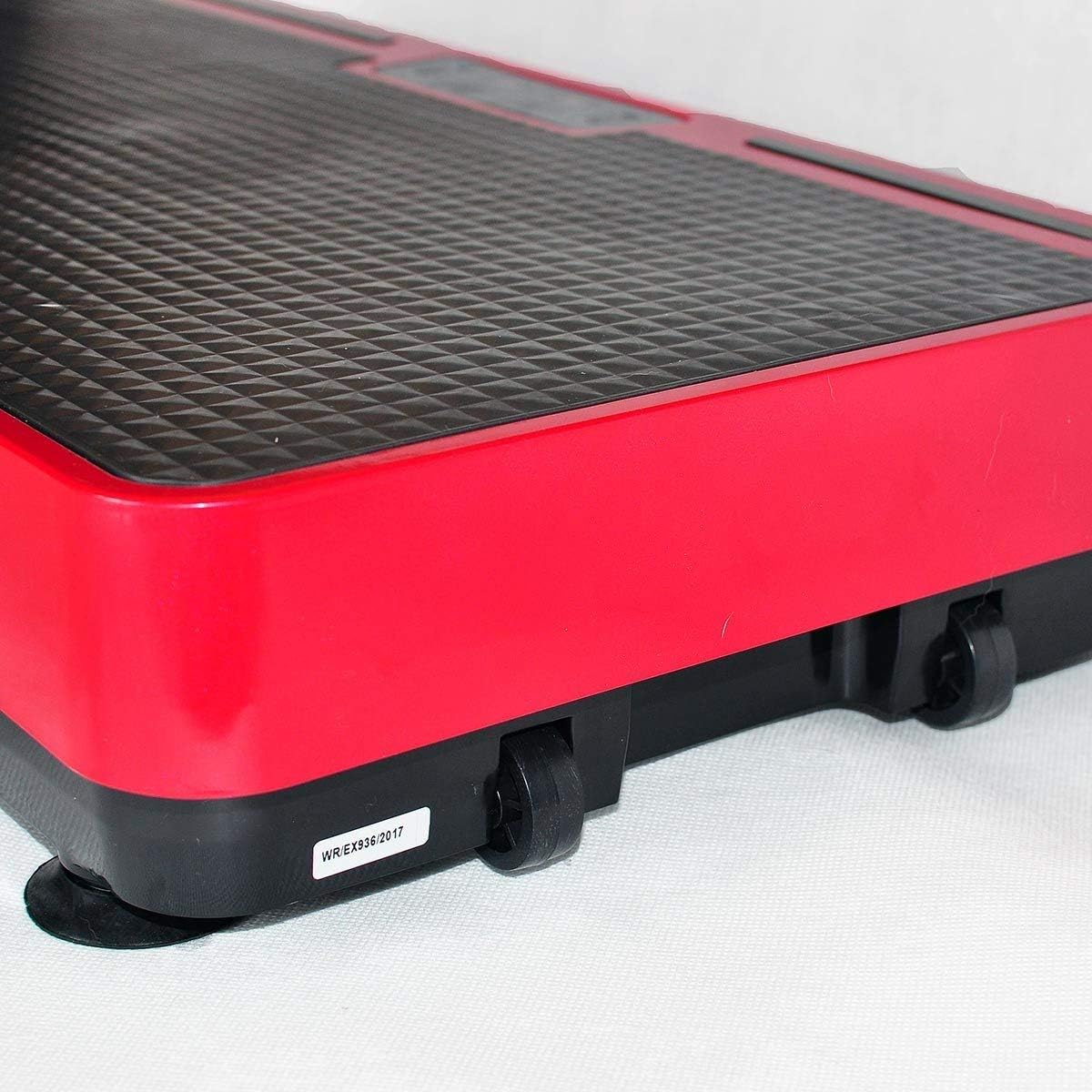 Woman performing lunges on vibrating platform