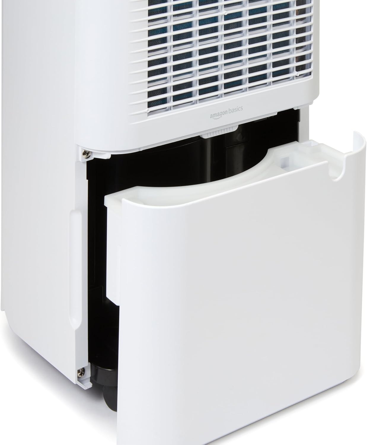 Close-up of the dehumidifier with the water tank partially pulled out