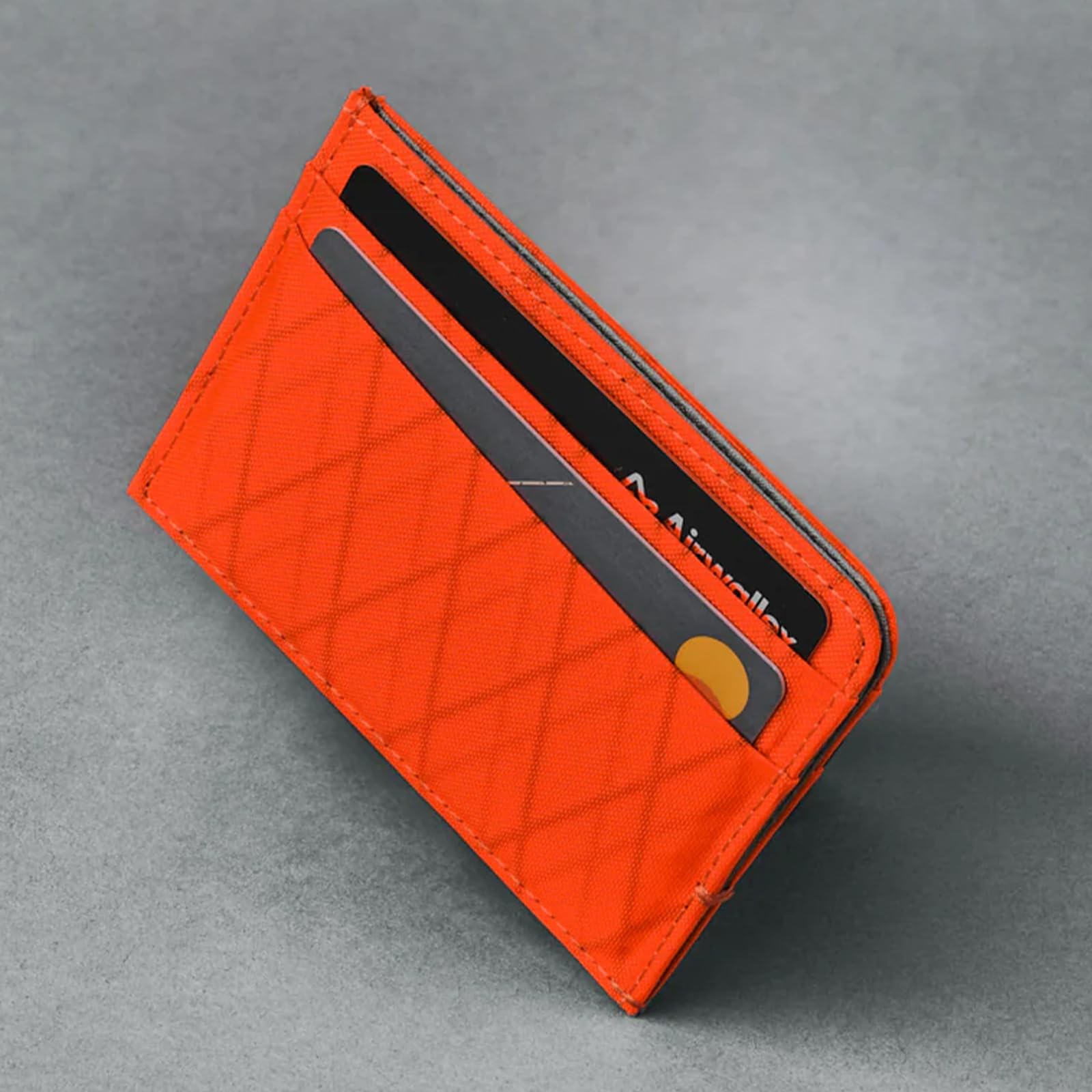 ALPAKA Portfel Ark Card - Smukły, minimalistyczny portfel z ochroną RFID, na 4-6 kart i gotówkę, przednia kieszeń, wodoodporny X-Pac VX21, pomarańczowy, S, Minimalistyczny