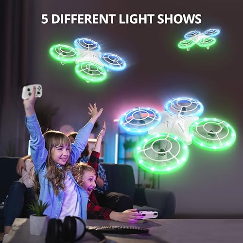 Miniatura 5 de TOMZON Drone A34 para niños con luces LED verdes y azules, Drone RC para niños con retención de altitud, giro 3D, modo sin cabeza y 3 velocidades,