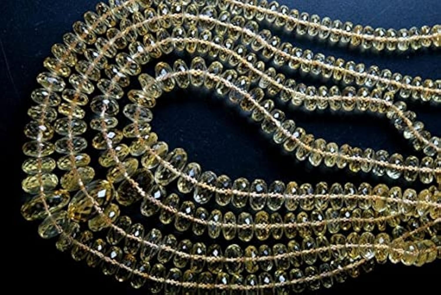 Citrine dorée facettée pour remplacer les perles ternes par des rondelles au lustre éclatant