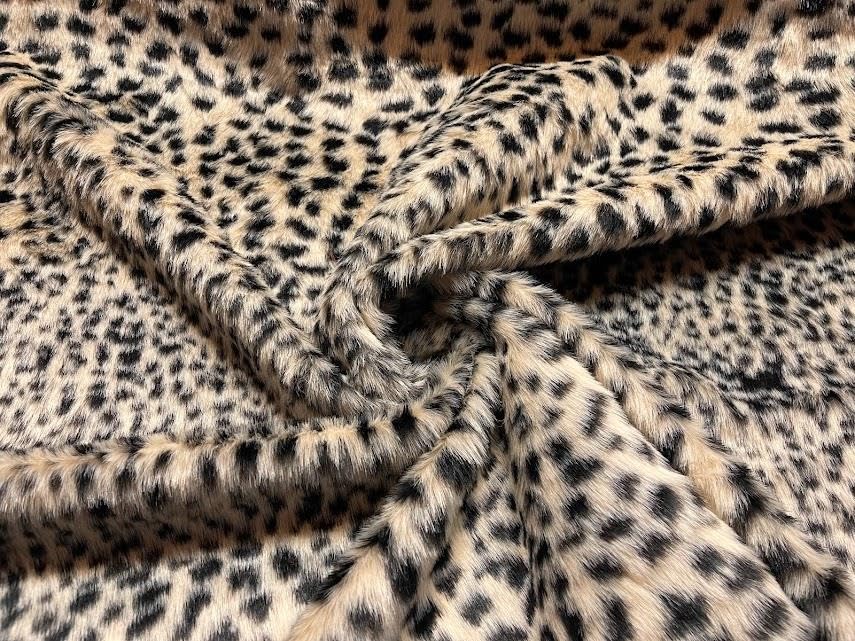 Tissu en fausse fourrure crème guépard au 1/2m pour plaid cocooning de salon